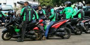 Merger Grab-Uber Berbuah Denda Rp141 Miliar di Singapura