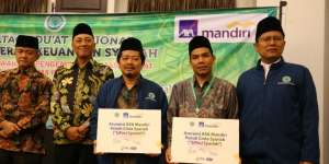 Gandeng MUI, AXA Mandiri Sosialisasi Asuransi Syariah