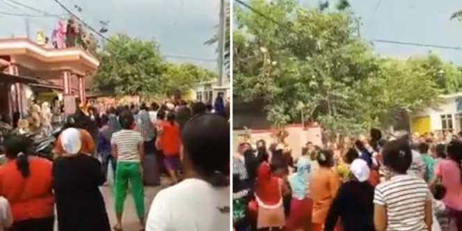 Heboh Satu Keluarga Sebar Uang dari Atap Rumah