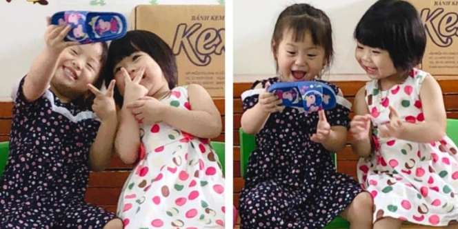 Bukan Smatphone, 2 Balita Menggemaskan Ini Selfie Pakai Sandal