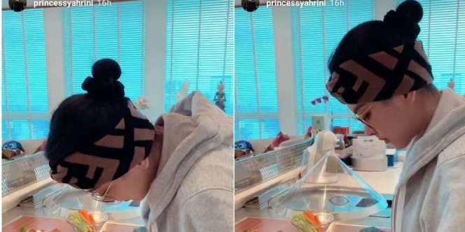 Penampilan Syahrini Saat Masak Jadi Sorotan