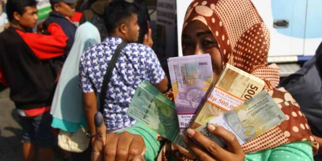 Menukar Uang Untuk Lebaran Termasuk Riba dan Haram?