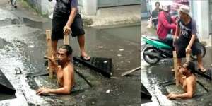 Viral Aksi Pria Menyelam ke Got Mampat di Bandung, Genangan Surut Seketika!
