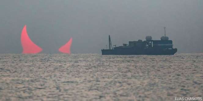 Geger Penampakan `Matahari Iblis` di Atas Laut