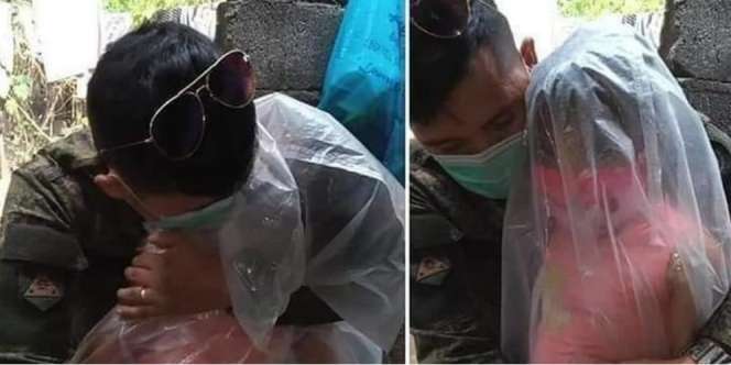 Foto Sendu Ayah Relawan Covid-19 Peluk Putri Dibungkus Plastik Demi Tak Tertular