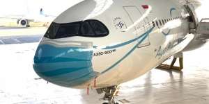 Pesawat Garuda Indonesia Sekarang 'Bermasker'