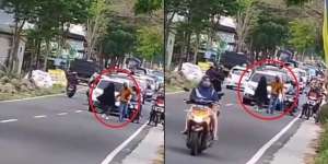 Ngambek dengan Pacar, Aksi Wanita Ini Bikin Macet Jalan