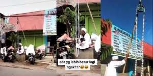 Viral Pria Berjubah Putih Pakai Tasbih Raksasa, Diputar dengan Kerekan Sumur