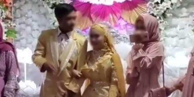 Viral Wanita Foto Bareng Mempelai di Pelaminan, Terus Nangis Sampai Pingsan