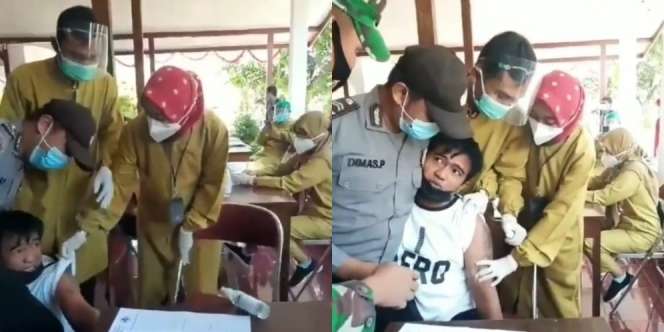 Tubuh Kekar Bertato, Tapi Takut Setengah Mati Saat Divaksin Sampai Peluk Polisi
