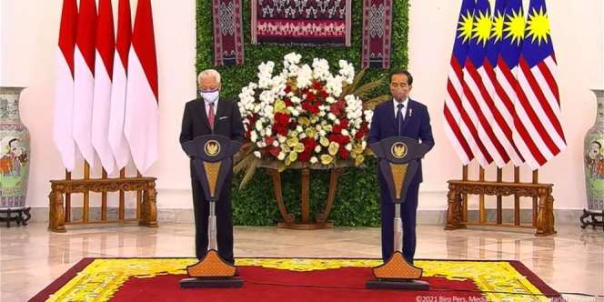 Indonesia-Malaysia Sepakati Buka Koridor Perjalanan Pulihkan Ekonomi