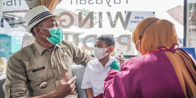 Vaccination Bus Datangi Anak-anak yang Belum Vaksinasi Covid-19