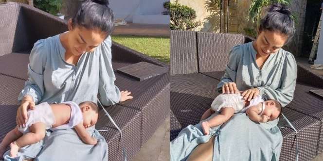 Potret Krisdayanti Saat Jemur Baby Ameena, Wajahnya Jadi Sorotan!
