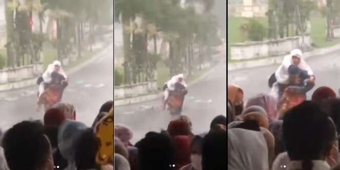 Momen Anak Gendong Ibu untuk Berteduh Saat Hujan Deras Jelang Sholat Idul Fitri, Warganet: Surga Menanti