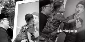 Nyesek! Sambil Digendong Ridwan Kamil, Arkana Elus-elus dan Cium Foto Eril