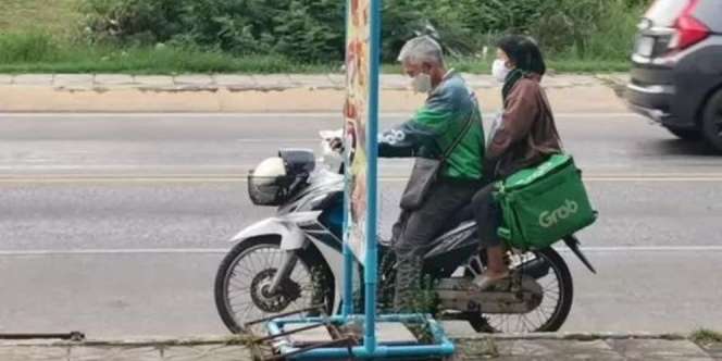 Couple Goals! Kisah Romantis Ojol Ajak Istri Antar Pesanan Makanan Bikin Warganet Baper