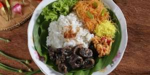 Menggugah Selera, Kelezatan Nasi Cumi Hitam Ini Bikin Perut Meronta