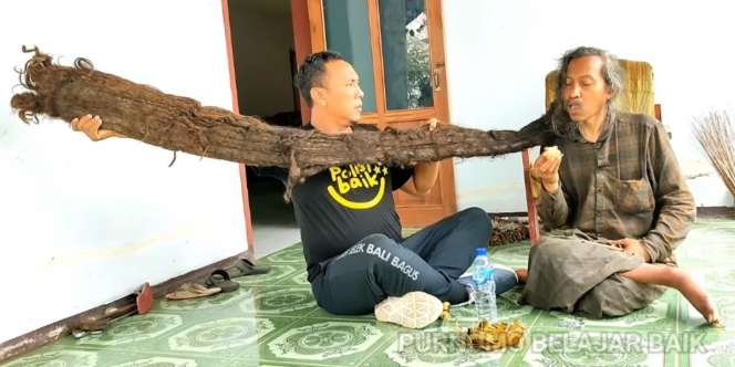 8 Tahun Belajar Ilmu Tak Pernah Dipotong, Rambut Pria Ini Panjangnya 3 Meter dan Sepintas Mirip Ular