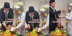 Aksi Kocak Pasangan Pengantin Kesulitan Potong Tumpeng, Ternyata Alot Sampai Harus Pakai Jurus Pamungkas