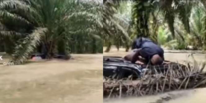 Momen Mendebarkan Pria Terjebak Banjir Sendirian, Ditemukan Tim Penyelamat Spontan Sujud Syukur di Atas Kap Mobil