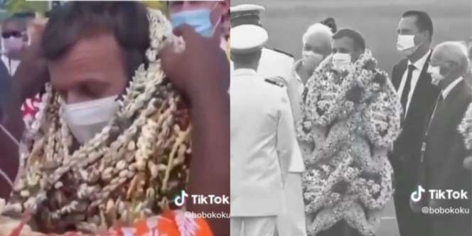 Momen Lucu Presiden Prancis Disambut Kalungan Bunga hingga Penuh Seluruh Tubuhnya