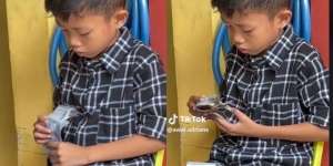 Momen Lucu Bocah Serius Hitung Uang Hasil THR, Warganet: Siap-Siap Masuk 'Investasi Bodong' Emak