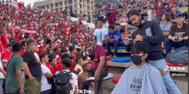 Aksi Kocak Tukang Cukur Rambut Layani Pelanggan Saat Pertandingan Timnas Indonesia vs Vietnam