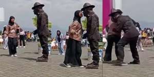 Wanita Ini Nekat Cium Patung di Pinggir Jalan, eh Ternyata Manusia Hidup dan Memeluknya
