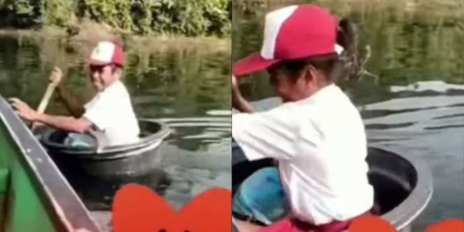 Salut! Perjuangan Bocah SD di Papua Pergi Sekolah, Seberangi Sungai Pakai Ember Plastik