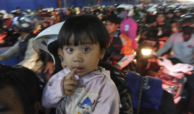 Ekspresi Lelah Anak Saat Mudik