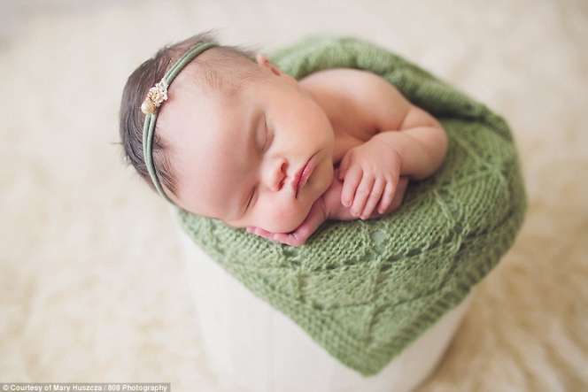 Potret Kebahagiaan Bayi Cantik Down Syndrome