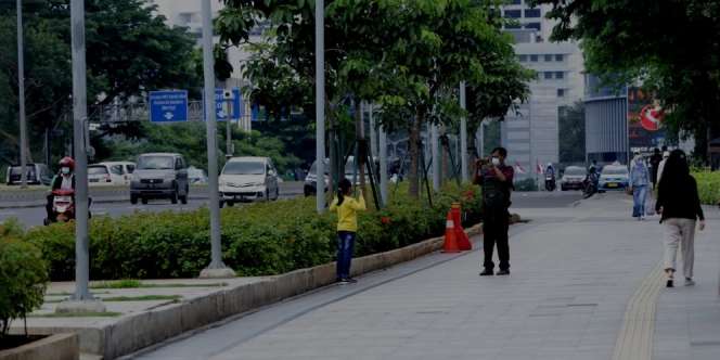 FOTO: Suasana Jakarta Diberlakukan PSBB Ketat