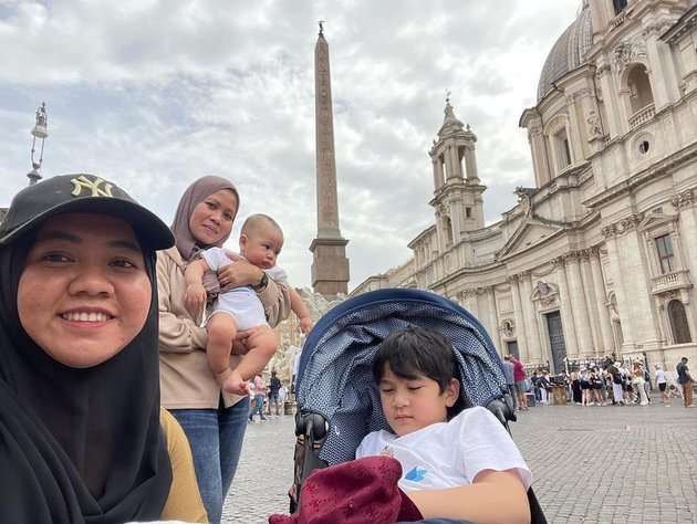 Gaya Rini Pengasuh Rayyanza Saat Diajak Liburan ke Eropa Naik Jet Pribadi, Netizen Malah Soroti Penampilannya