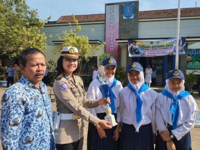Potret Kasatlantas Polres Malang AKP Agnis Juwita Manurung saat Bertugas, Viral karena Gaya Hidup Hedon